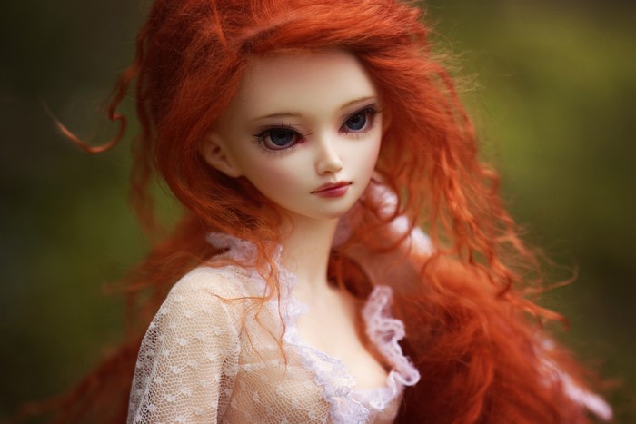 Ball-jointed doll with long red hair