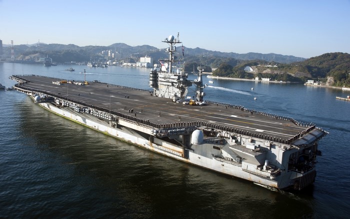 USS George Washington aircraft carrier in a harbor