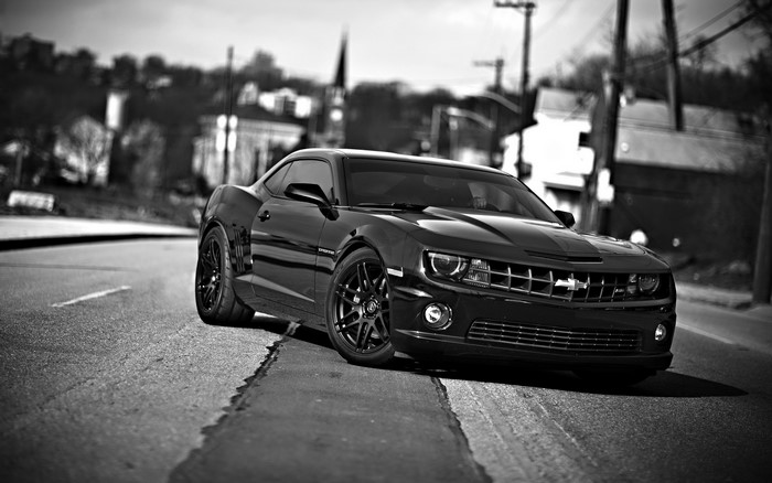 Black Chevrolet Camaro SS on a Road
