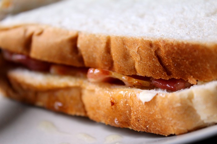 Closeup of a sandwich with white bread and filling