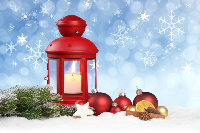 Christmas lantern with candle and ornaments