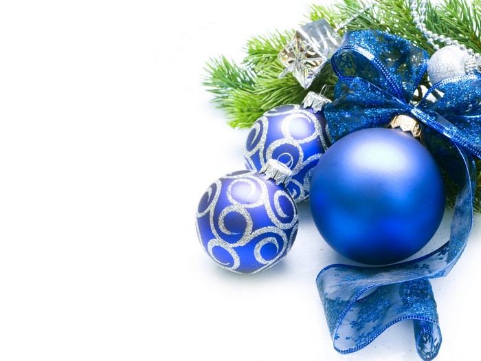 Christmas ornaments with pine branches and ribbon