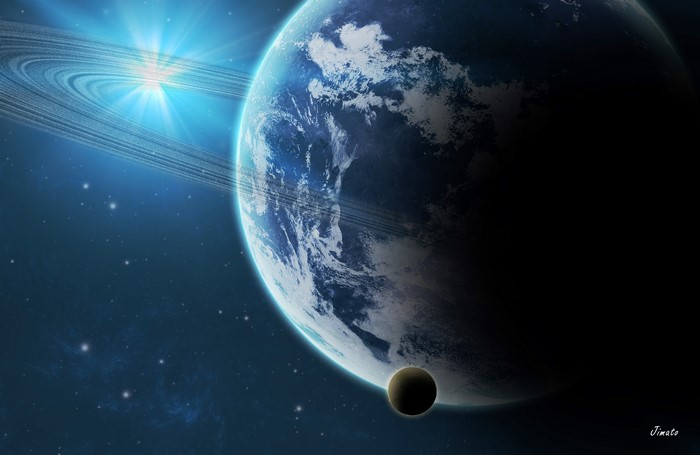 Planet with rings and moon in space