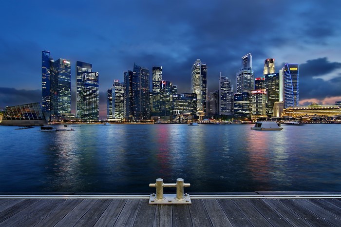 Singapore skyline at dusk with waterfront and skyscrapers