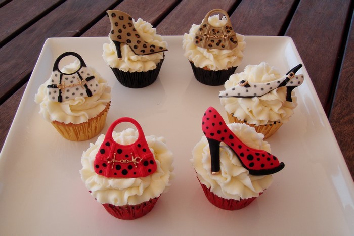Cupcakes decorated with high heels and handbags