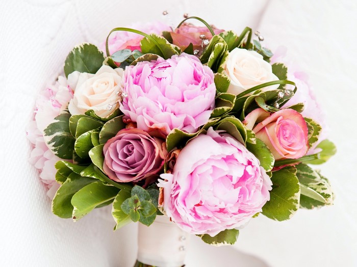Pink and purple peonies and roses bouquet