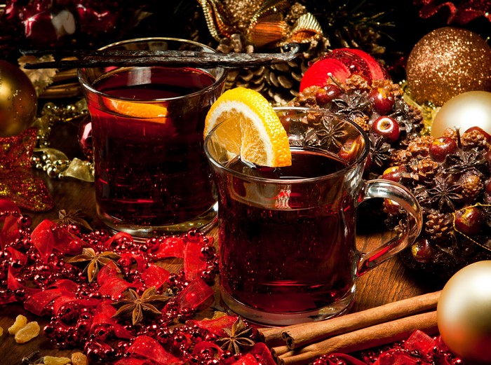Mulled wine with orange and Christmas decorations
