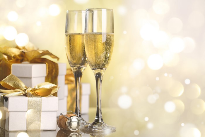 Champagne Glasses and Gifts with Bokeh Lights
