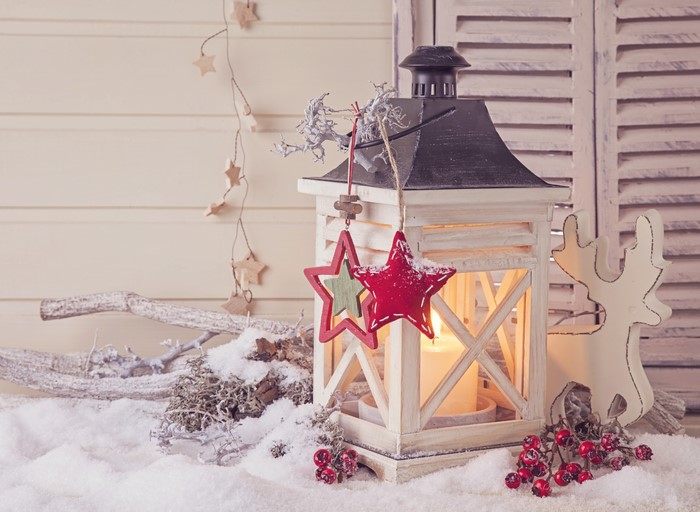Christmas lantern with candle and decorations