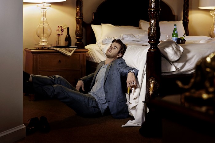 Chris Hemsworth in a hotel room