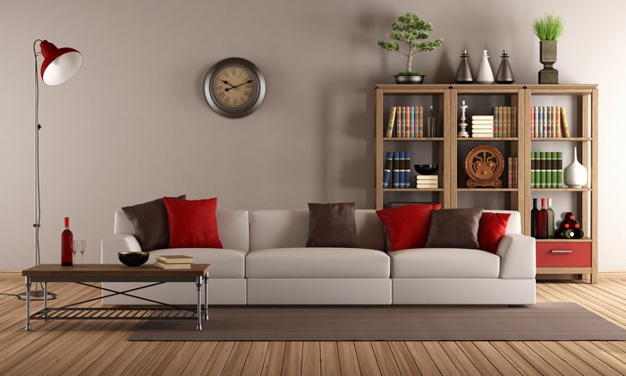 Living room with sofa, coffee table, and bookshelf
