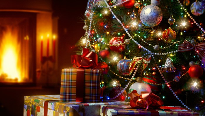 Christmas tree with gifts and fireplace