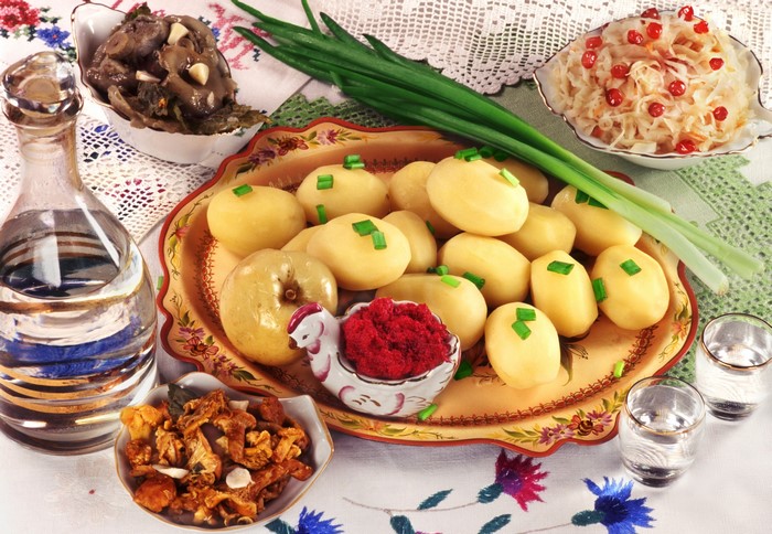 Still life with potatoes, mushrooms, cabbage, and vodka