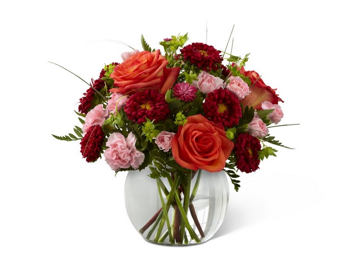 Orange Roses and Red Dahlias in a Glass Vase