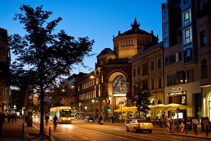 Berlin Street Scene at Night with Tram and Buildings