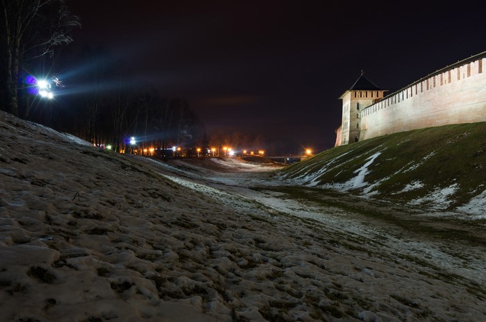 Winter night in Russia with fortress and street lights