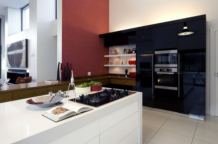 Modern kitchen with dark cabinets and island