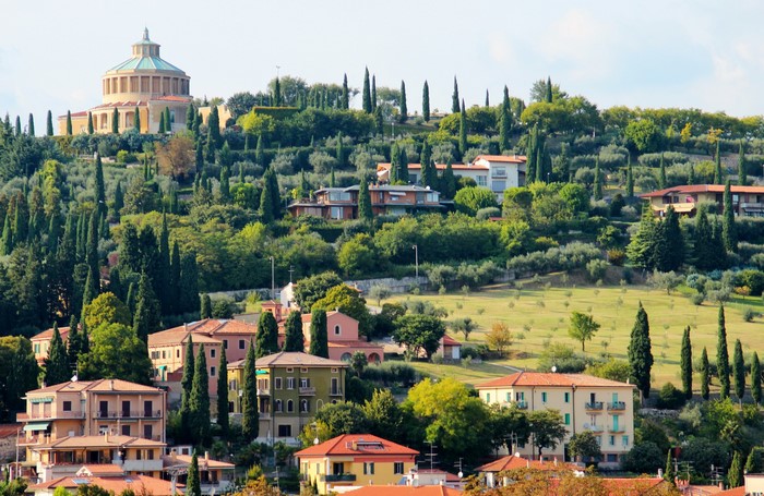 Verona, Italy: Hillside with Houses and a Dome Church