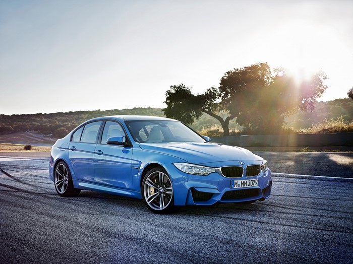 Blue BMW M3 on a Race Track