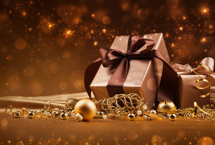 Christmas Gifts with Gold Ornaments and Bokeh