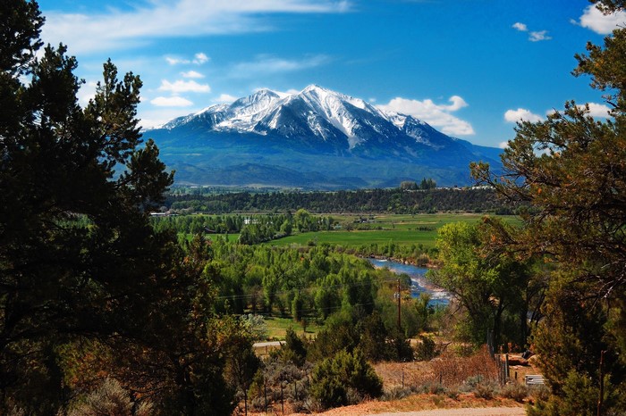 Snow-capped mountains over a valley in Colorado