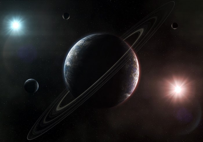 Planets with rings and moons in space with stars