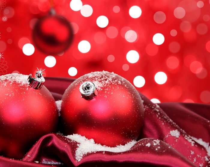 Red Christmas Ornaments with Snow and Bokeh