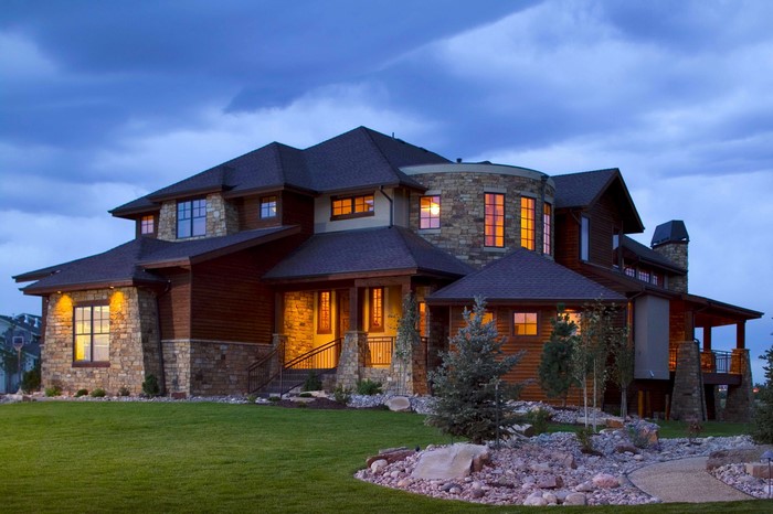 Luxury stone and wood house with landscape design