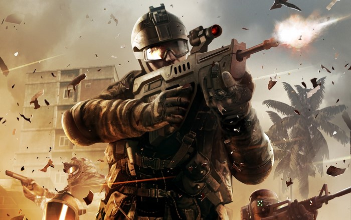 Soldiers firing rifles in a warzone