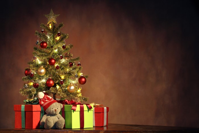 Christmas tree with gifts and teddy bear