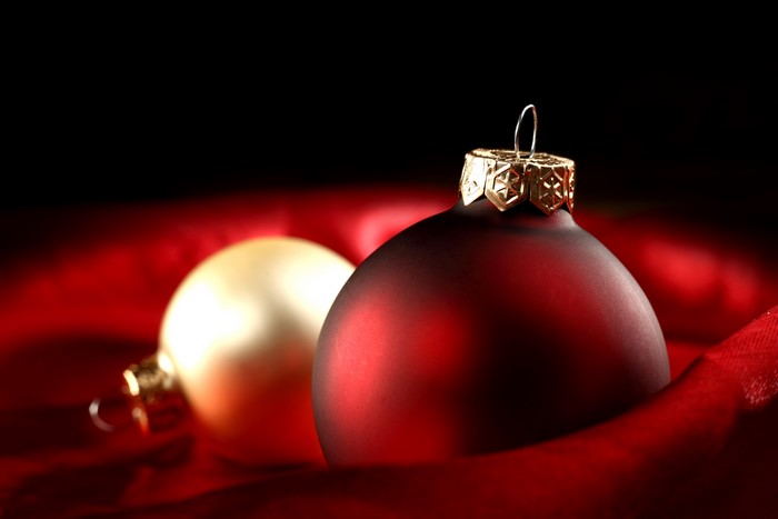 Christmas ornaments on red fabric