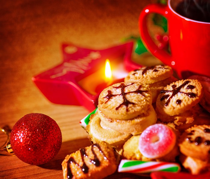 Christmas cookies and coffee with candle
