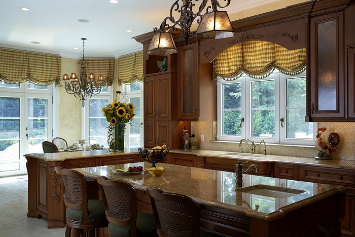 Kitchen with island, chandelier, and sunflowers