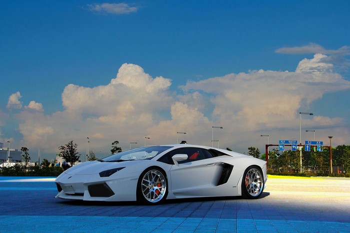 White Lamborghini Aventador LP 700-4 parked outdoors