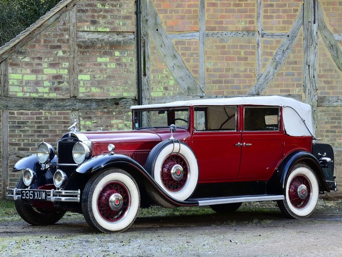 1931 Packard Standard Eight convertible in front of brick building