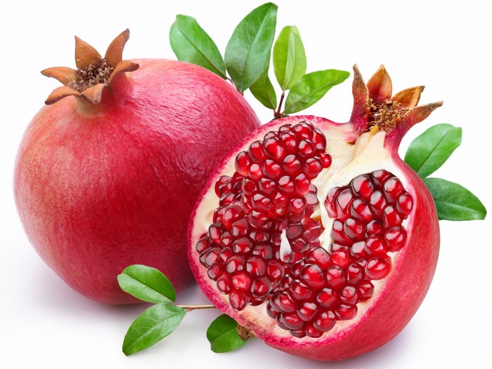 Pomegranate fruit with leaves
