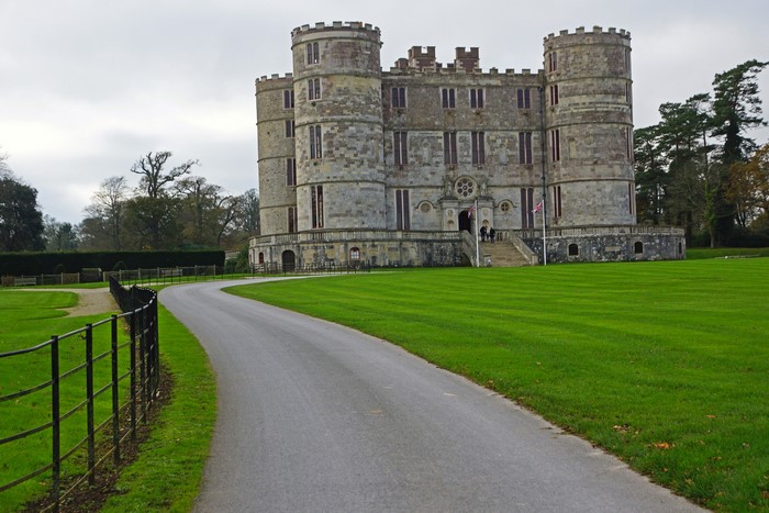 Castle in Lulworth, England with a winding road