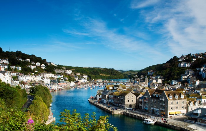 Houses along a river in Looe, Cornwall, England