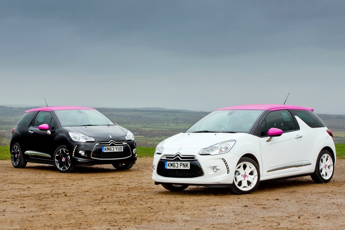 Two Citroen DS3 cars with pink roofs
