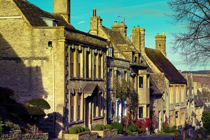 Stone houses on a street in Burford, Oxfordshire, England