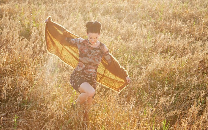 Katy Perry in a field of grass