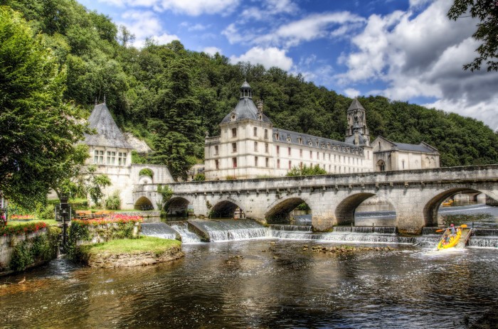 Brantome, France: River, Bridge, and Historic Buildings