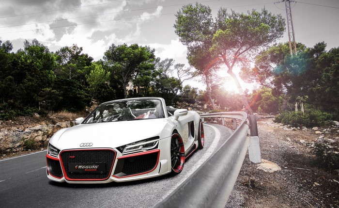 White Audi R8 V10 Spyder Convertible on a Winding Road