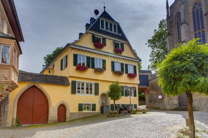 Yellow house and church in Meisenheim, Germany