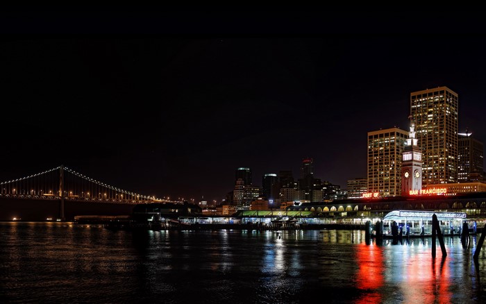 San Francisco skyline and bridge at night