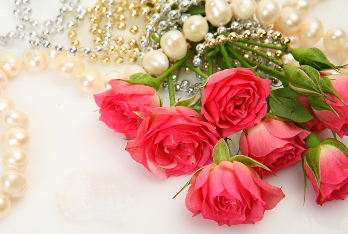 Pink roses with pearls and beads