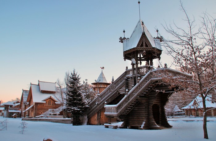 Wooden Russian architecture in winter snow