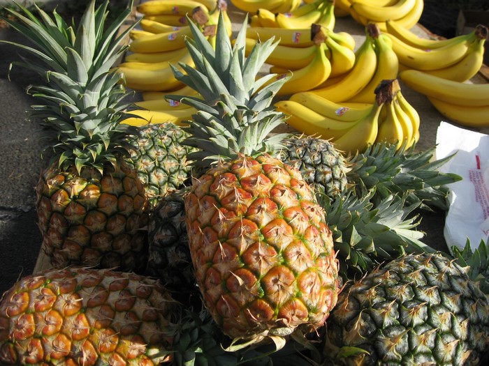 Pineapples and Bananas at a Market