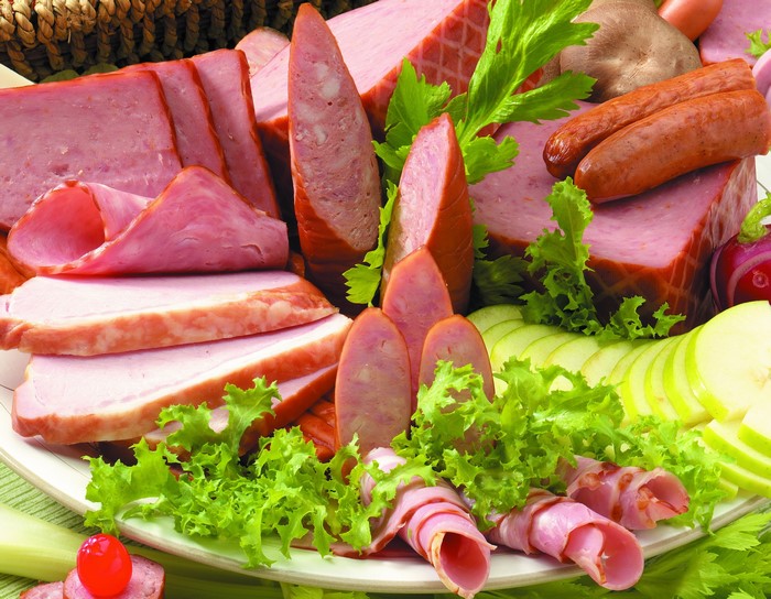 Assortment of sliced meats and sausages