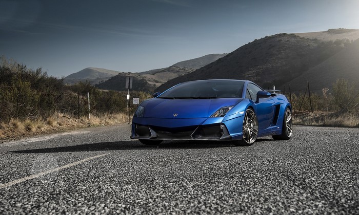 Blue Lamborghini Gallardo LP550-2 Renazzo on a mountain road